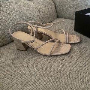 Lightly used heeled sandals.